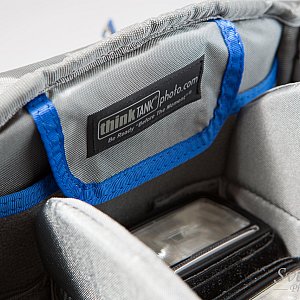 Side pocket in the main compartment